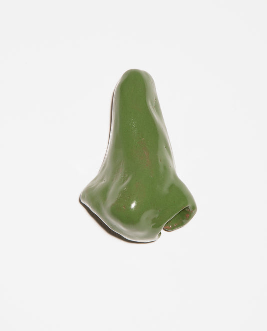 Petite sculpture. Nez en céramique grès émaillé vert gazon.